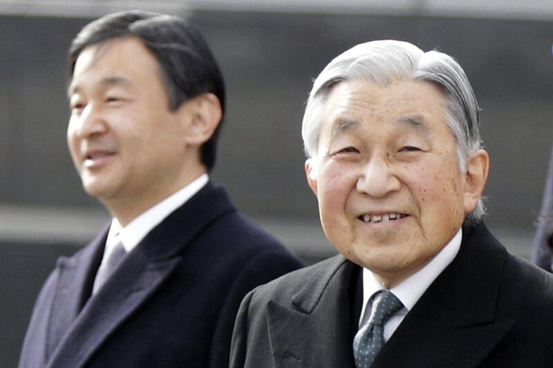 Japan’s emperor Akihito, right, and crown prince Naruhito walk at Haneda international airport in Tokyo. Japan’s cabinet has approved legislation to to allow 83-year-old emperor Akihito to abdicate. The legislation would allow Naruhito to succeed his father as emperor. Eugene Hoshiko / AP / January 26, 2016