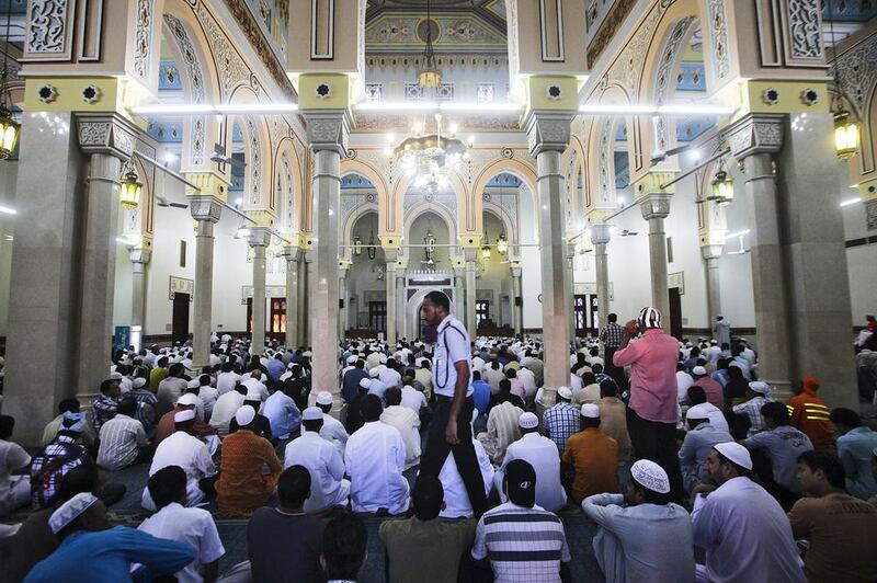 Worshippers pray inside of the Jumeirah Mosque in Dubai.

Lee Hoagland/The National