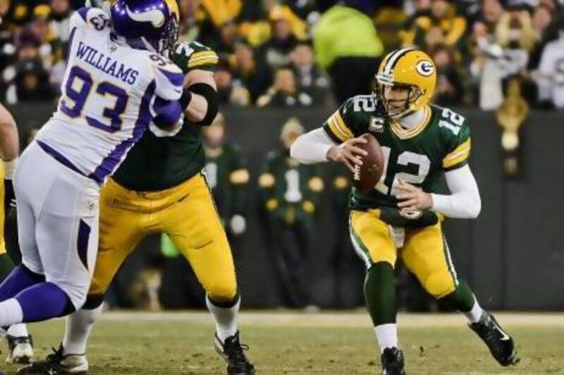 The Green Bay Packers's offensive line surrendered 51 sacks this season and know that for quarterback Aaron Rodgers, right, to be effective against the San Francisco 49ers in their play-off game they will have to protect him better.