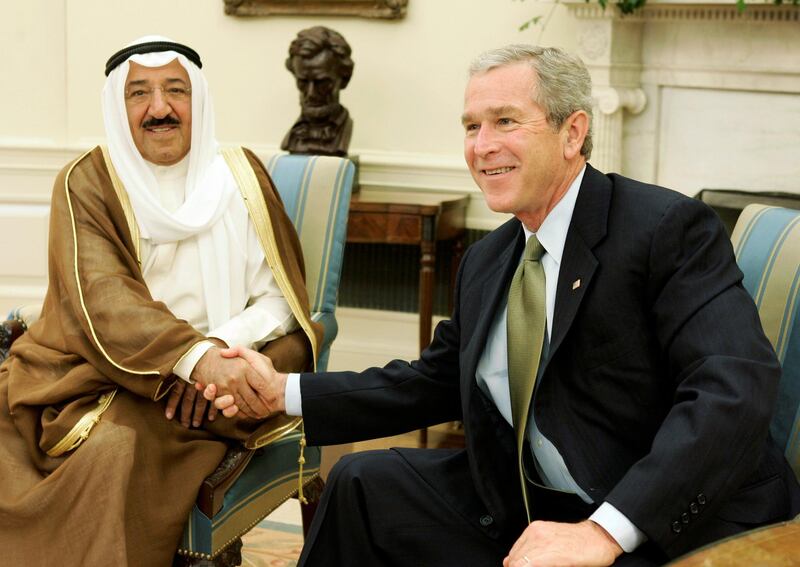 U.S. President George W. Bush (R) shakes hands with Kuwait's Prime Minister Sabah al-Ahmad al-Jaber al-Sabah in the Oval Office of the White House in Washington, DC July 1, 2005. Sabah al-Ahmad al-Jaber al-Sabah is in Washington on an official visit. REUTERS/Jason Reed  JIR/CN
