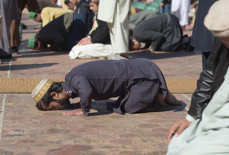 Rozi Khan offers Friday prayers at a mosque in Rawalpindi.  AFP