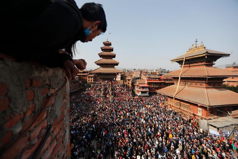 Devotees pull chariots containing images of Hindu gods Bhairava and Bhadrakali at the Biska Jatra festival to celebrate Nepalese New Year in Bhaktapur, Nepal. AP