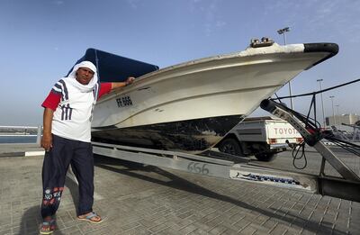 Fujairah, April 26, 2018: Yousef Baroun pose next to his  boat which was attacked by the pirates at the fisherman port in Fujairah . Satish Kumar for the National / Story by Ruba Haza