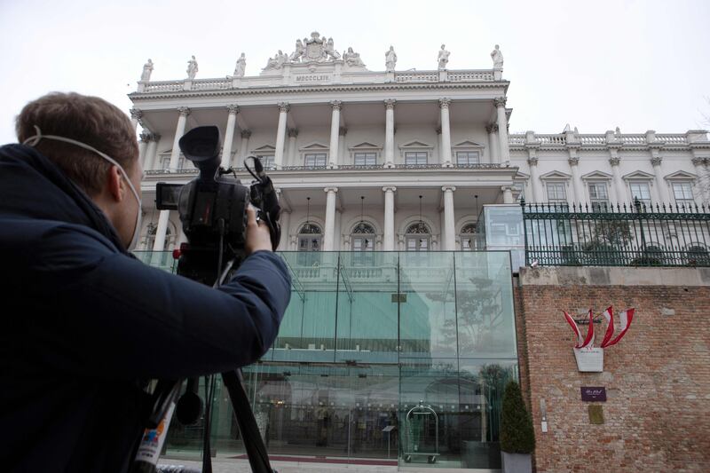 A cameraman films Hotel Palais Coburg, venue for the meeting to revive the JCPOA, in Vienna this month. AFP