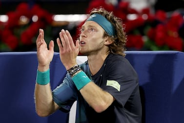 DUBAI, UNITED ARAB EMIRATES - MARCH 01: Andrey Rublev reacts to being dismissed by the court supervisor after shouting at a line judge while playing Alexander Bublik of Kazakhstan in their semifinal match during the Dubai Duty Free Tennis Championships at Dubai Duty Free Tennis Stadium on March 01, 2024 in Dubai, United Arab Emirates. (Photo by Christopher Pike / Getty Images)