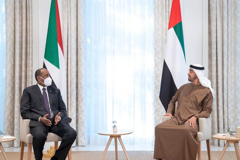 ABU DHABI, UNITED ARAB EMIRATES - May 09, 2021: HH Sheikh Mohamed bin Zayed Al Nahyan, Crown Prince of Abu Dhabi and Deputy Supreme Commander of the UAE Armed Forces (R), meets with Lt General Abdel Fattah Al Burhan, Chairman of Sudan's Sovereign Council (L), at Al Shati Palace.

( Rashed Al Mansoori / Ministry of Presidential Affairs )
---