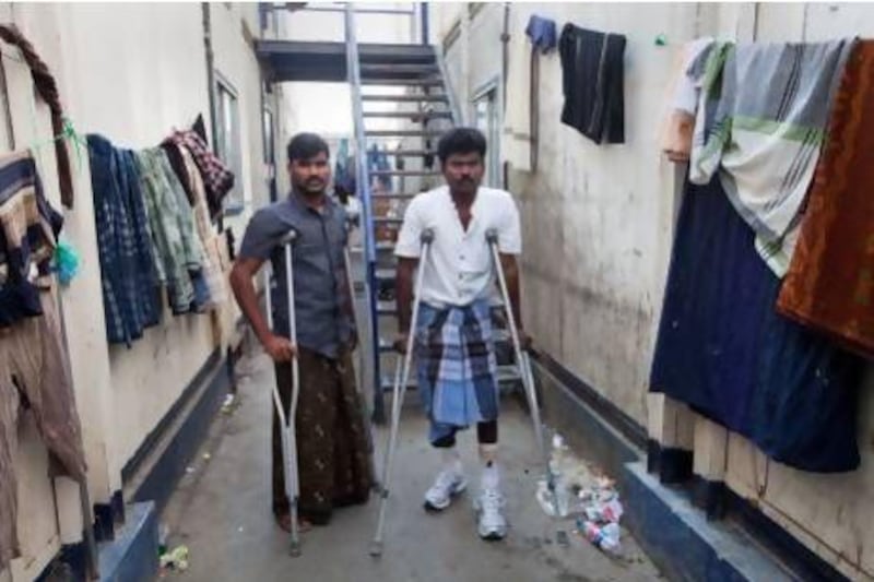 Fishermen Pandu Sanadhan (left) and Muthu Muniraj are recovering at their accommodation inside the Dubai Offshore sailing Club after being shot at by the US navy