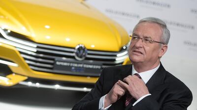 epa06710188 (FILE) - Former CEO of German car manufacturer Volkswagen (VW), Martin Winterkorn, fixes his tie prior to the start of the balance press conference in Berlin, Germany, 12 March 2015 (reissued 04 May 2018). Former Volkswagen CEO, Martin Winterkorn, has been indicted on fraud charges in the US over its efforts to conceal compliance with US federal emission standards.  EPA/JOCHENÂ LUEBKE  GERMANY OUT