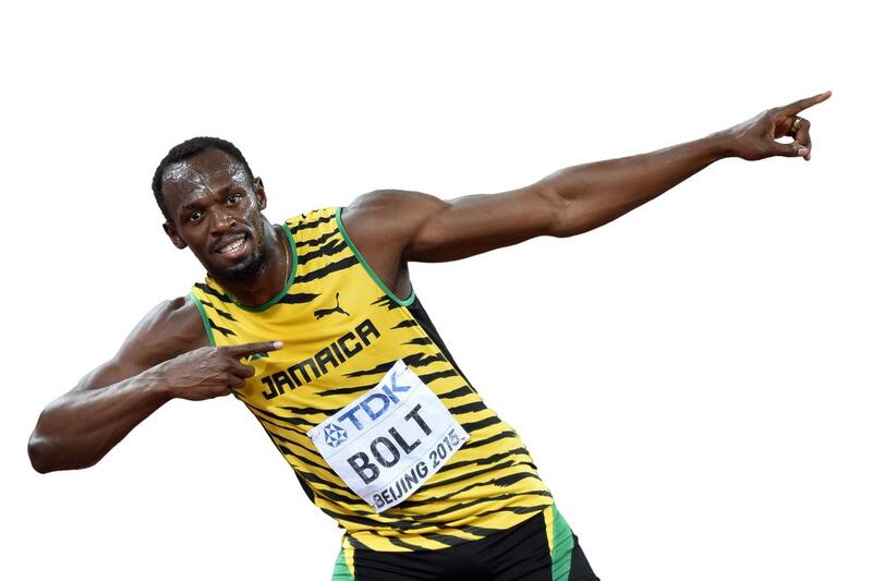 Jamaica's Usain Bolt celebrating after winning the final of the men's 100 metres athletics event at the 2015 IAAF World Championships in Beijing. AFP PHOTO / PEDRO UGARTE