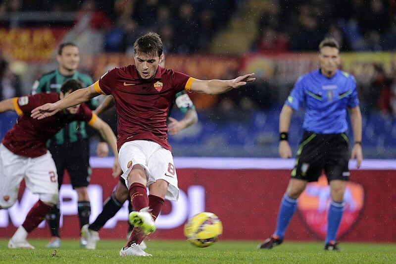 AS Roma's Adem Ljajic scores from the penalty spot during his side's 2-2 Serie A draw with Sassuolo on Saturday at the Stadio Olimpico. Riccardo Antimani / EPA / December 6, 2014