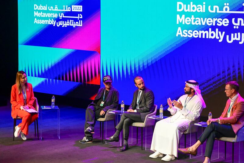 From left, The National's Sarah Forster moderates a discussion with Samuel Hamilton of the Decentraland Foundation, Majid Al Futtaim's Joe Abi Akl, Damac Properties' Ali Sajwani and Guy Parsonage from PwC on 'Opportunities in Virtual Real Estate'.