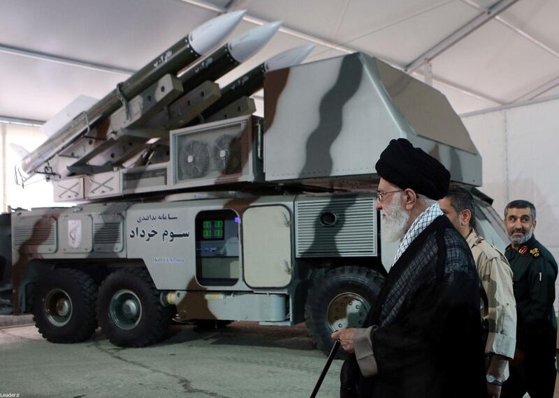 Iran's Supreme Leader Ayatollah Ali Khamenei is seen near a "3 Khordad" system which is said to had been used to shoot down a U.S. military drone, according to news agency Fars, in this undated handout picture. Fars news/Handout via REUTERS ATTENTION EDITORS - THIS IMAGE WAS PROVIDED BY A THIRD PARTY. NO RESALES. NO ARCHIVES. REUTERS IS UNABLE TO INDEPENDENTLY VERIFY THIS IMAGE.