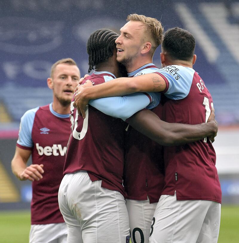 LEICESTER, ENGLAND - OCTOBER 04:  Michail Antonio (2nd L) of West Ham United celebrates with Jarrod Bowen 92nd R) and Pablo Fornals (R) after scoring during the Premier League match between Leicester City and West Ham United at The King Power Stadium on October 4, 2020 in Leicester, United Kingdom. Sporting stadiums around the UK remain under strict restrictions due to the Coronavirus Pandemic as Government social distancing laws prohibit fans inside venues resulting in games being played behind closed doors.  (Photo by Arfa Griffiths/West Ham United FC via Getty Images)