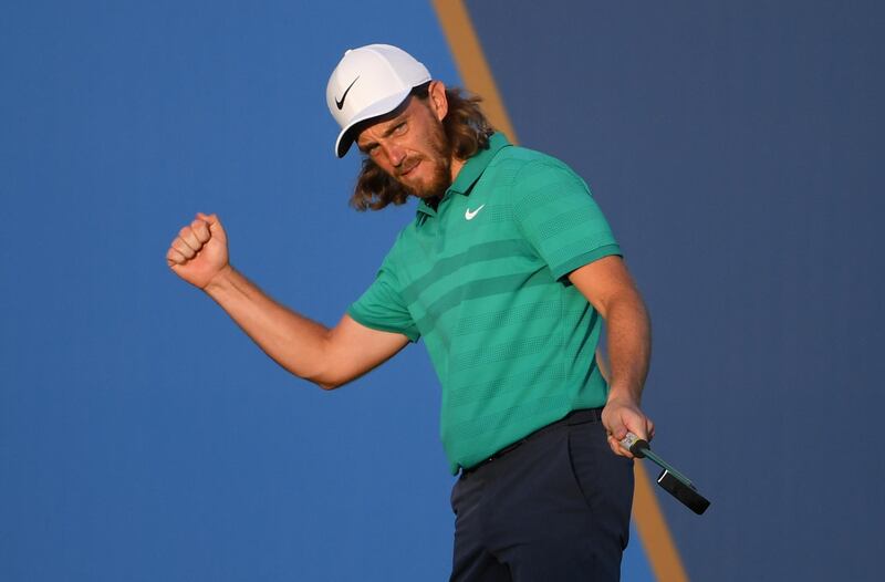 DUBAI, UNITED ARAB EMIRATES - NOVEMBER 15:  Tommy Fleetwood of England celebrates a birdie on the 18th green during day one of the DP World Tour Championship at Jumeirah Golf Estates on November 15, 2018 in Dubai, United Arab Emirates.  (Photo by Ross Kinnaird/Getty Images)