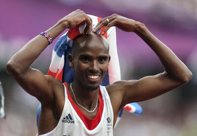 LONDON, ENGLAND - AUGUST 11:  Mohamed Farah of Great Britain celebrates winning gold in the Men's 5000m Final on Day 15 of the London 2012 Olympic Games at Olympic Stadium on August 11, 2012 in London, England.  (Photo by Clive Brunskill/Getty Images)