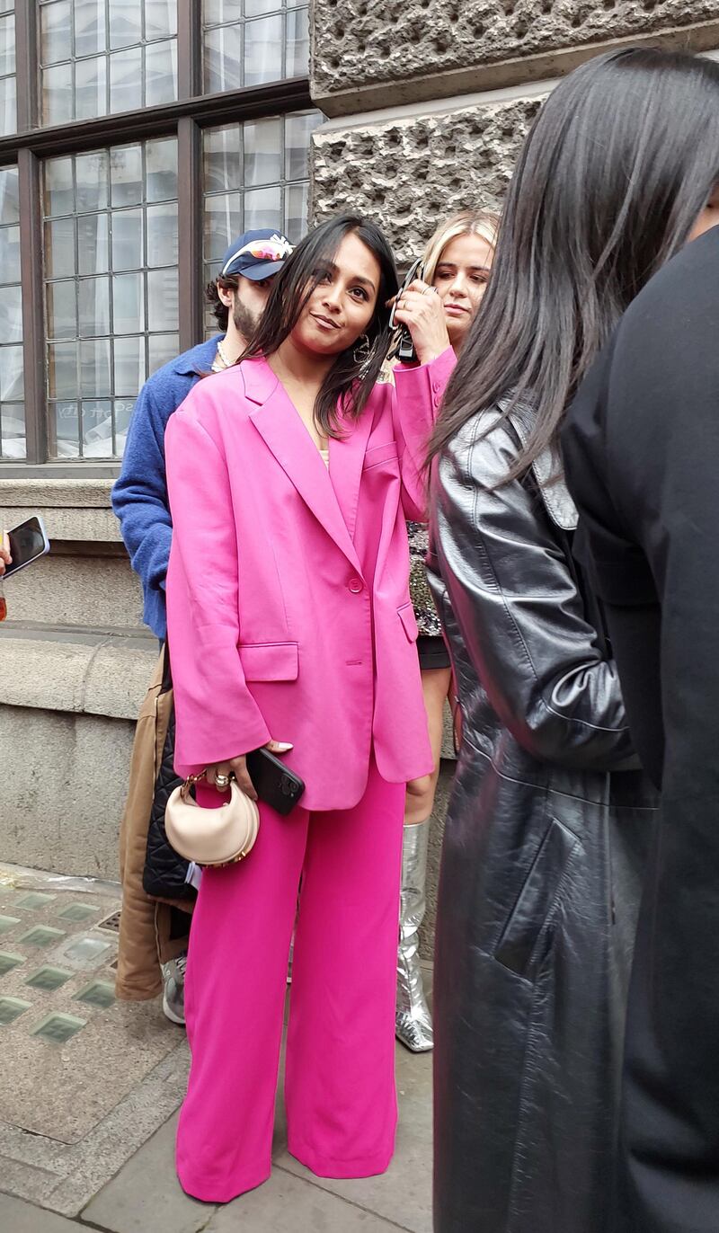 An oversized bubblegum pink suit in London.