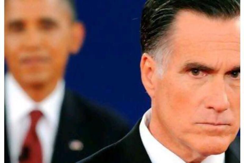 A reader says Mitt Romney's track record suggests that he'd be a moderate president. Saul Loeb / AFP