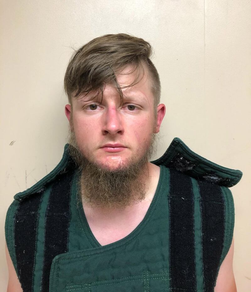 A handout booking photo made available by the Crisp County Sheriff's Office shows Robert Aaron Long, 21, a suspect in series of fatal shootings that occured in three massage parlors in metro Atlanta, Georgia, USA. At least eight people were reported dead following a string of shootings at three metro Atlanta massage parlors. EPA