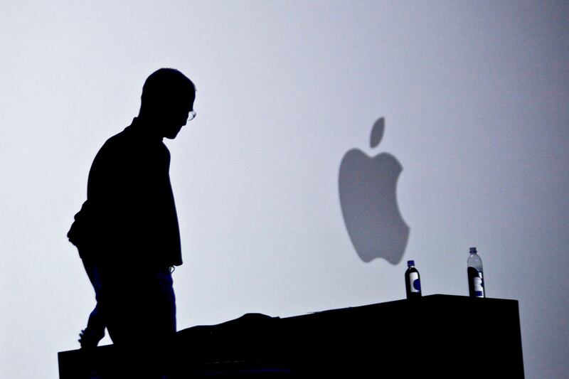 (FILES): This June 7, 2010 file photo shows Apple chief executive Steve Jobs introducing the iPhone 4 during the keynote address at the Apple Worldwide Developers Conference in San Francisco, California. Apple on Wednesday, October 5, 2011 announced the death of its visionary co-founder Steve Jobs from cancer at 56.  "We are deeply saddened to announce that Steve Jobs passed away today," the company's board of directors said in a statement.      AFP PHOTO / Files / Ryan Anson
 *** Local Caption ***  988365-01-08.jpg