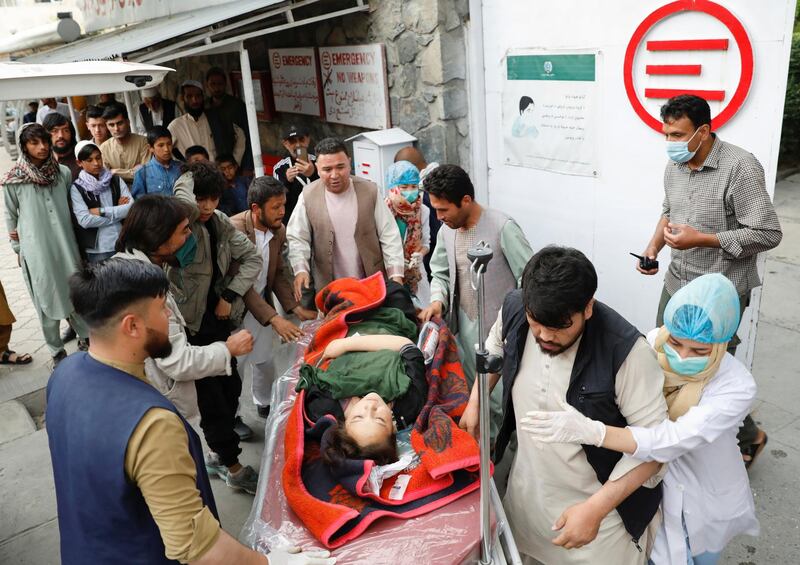 An injured woman is transported to a hospital after a blast in Kabul, Afghanistan. Reuters