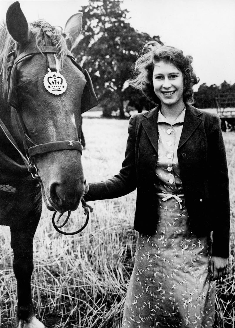 Princess Elizabeth at Sandringham, with a horse, in 1943. AFP