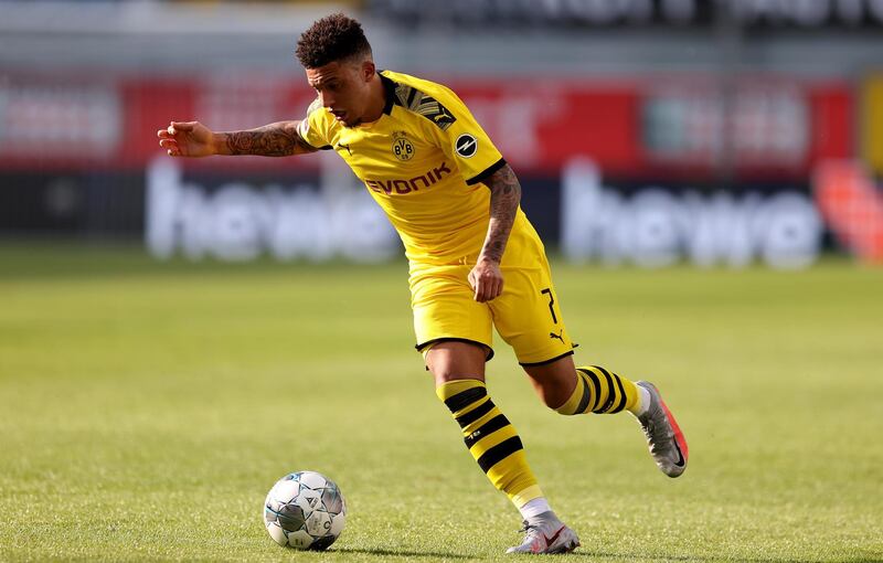 Sancho  runs with the ball during the German Bundesliga soccer match between Paderborn and Borussia Dortmund . EPA