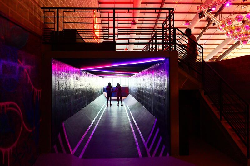 People doing roller skating at the RollDXB roller disco which opens at Shed 3 Marina Cubes Street, Dubai Maritime City, Port Rashid, Bur Dubai on April 25,2021. (Pawan Singh/The National). Story by Sophie Prideaux 