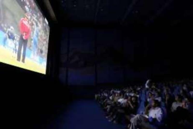 
DUBAI, UNITED ARAB EMIRATES, April 25: People enjoying the live telecast of final match of Indian Premier League at Grand Hyatt cinema in Dubai. (Pawan Singh / The National) For News. Story by Paul