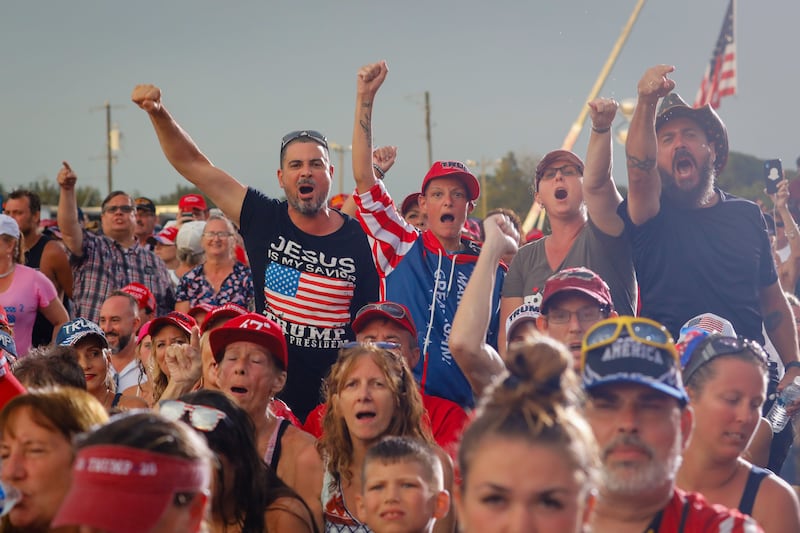 People cheer at a Maga rally in Sarasota, Florida. Getty Images / AFP
