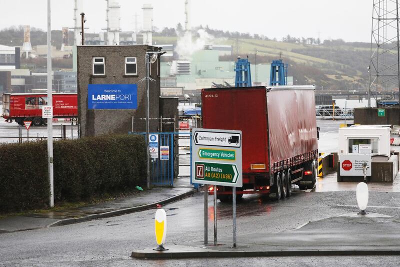 Vehicles at the port of Larne, Northern Ireland, Tuesday, Feb. 2, 2021.  Authorities in Northern Ireland have suspended post-Brexit border checks on animal products and withdrawn workers after threats against border staff. (AP Photo/Peter Morrison)