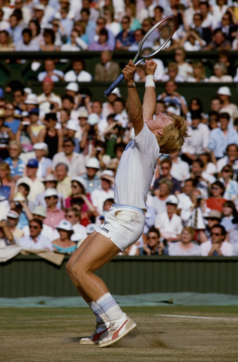 Becker celebrates his 1985 Wimbledon win. Aged 17 years, 227 days, he was the youngest male Grand Slam winner at the time. Getty Images