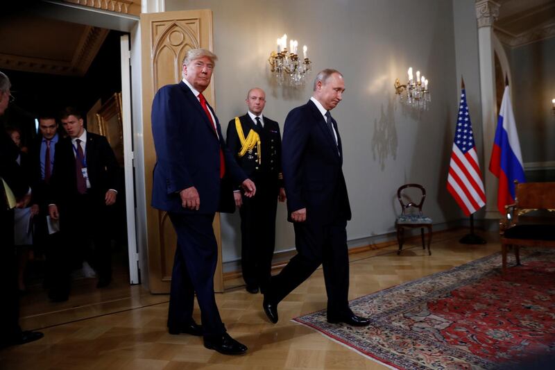 US President Donald Trump meets with Russia's President Vladimir Putin in Helsinki, Finland. Reuters