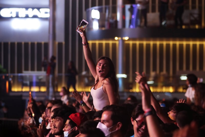 People enjoy the set by DJ Martin Garrix during the 2021 Abu Dhabi F1 concert. All photos: Pawan Singh / The National