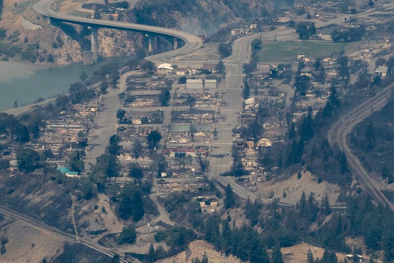 Structures destroyed by a wildfire are seen in Lytton, British Columbia.
