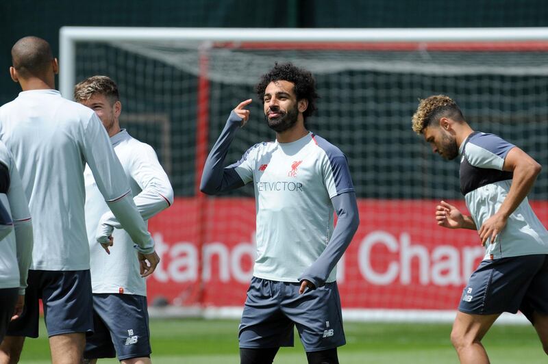 Liverpool's Mohamed Salah, center, takes part in a training session ahead of their Champions League Final. AP Photo