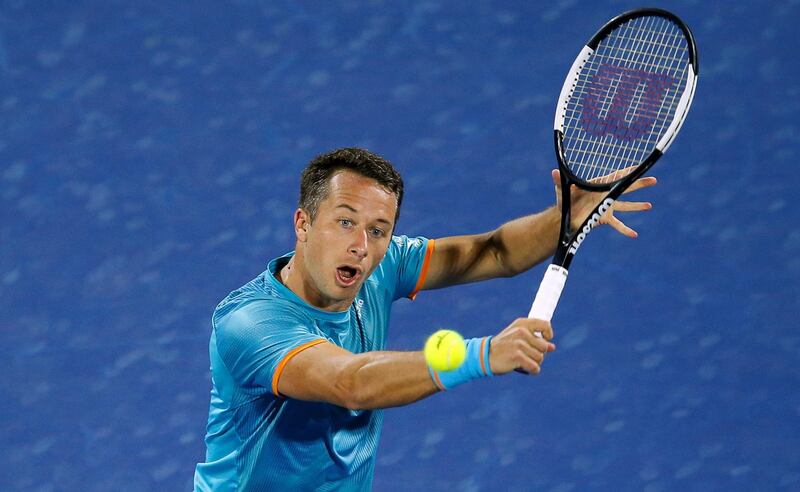 Philipp Kohlschreiber returns a backhand against Roger Federer. EPA