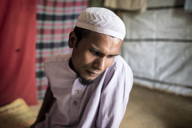 Jahid Hussein, 33, cries as he recounts how he said he say eight members of his immediate family killed by members of the Myanmar military. Kutupalong refugee camp near Cox's Bazar, Bangladesh, August 13 2018. Campbell MacDiarmid for The National