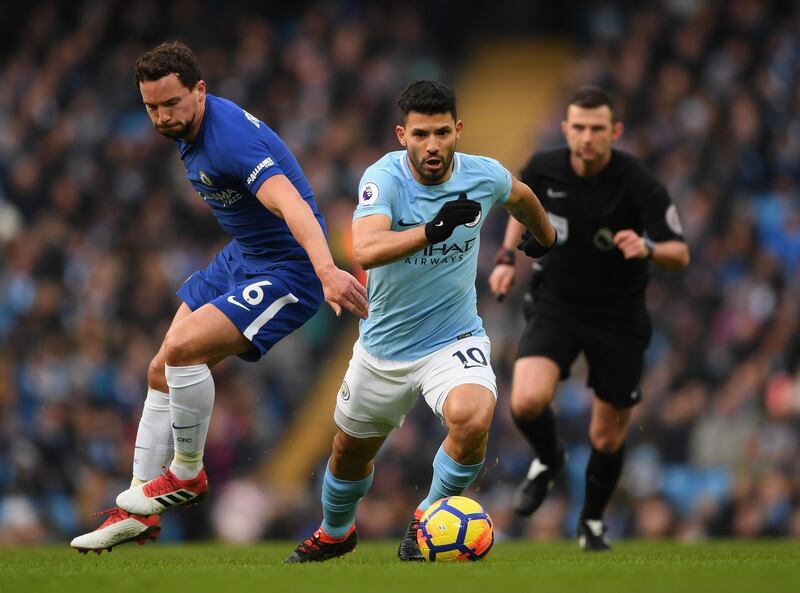 MANCHESTER, ENGLAND - MARCH 04:  Sergio Aguero of Manchester City breaks away from Danny Drinkwater of Chelsea during the Premier League match between Manchester City and Chelsea at Etihad Stadium on March 4, 2018 in Manchester, England.  (Photo by Shaun Botterill/Getty Images)