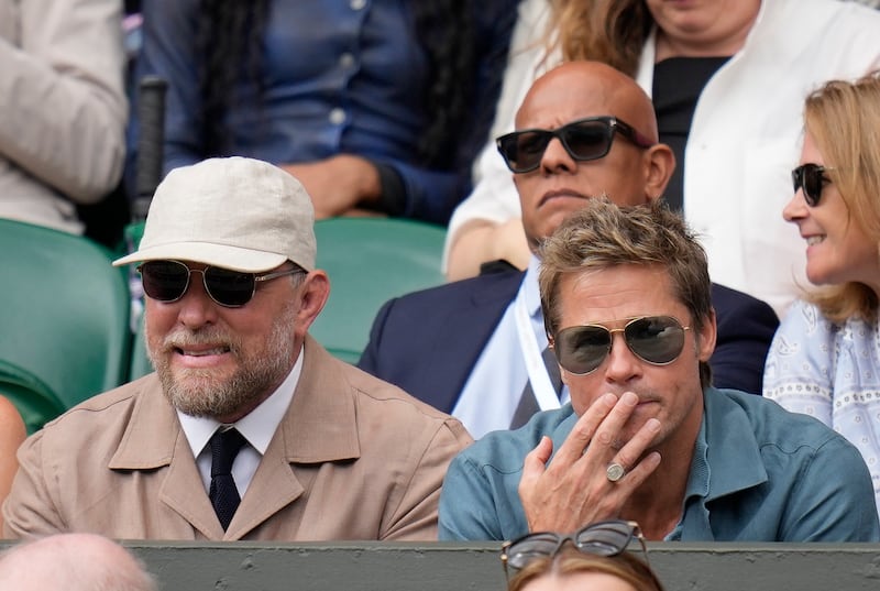 Actor Brad Pitt and director Guy Ritchie in the stands. AP 