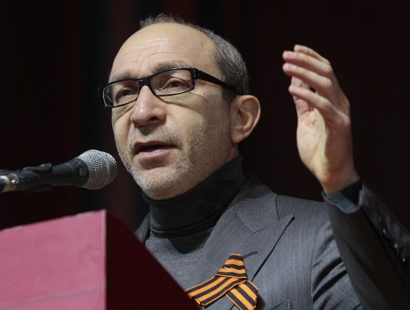 Hennady Kernes, the mayor of Kharkiv, speaks at the congress of provincial lawmakers and officials in the eastern Ukrainian city on February 22, 2014. He was shot in the back on April 28, 2014, and was said to be undergoing surgery, according to the city hall. Sergei Chuzavkov / AP Photo / 