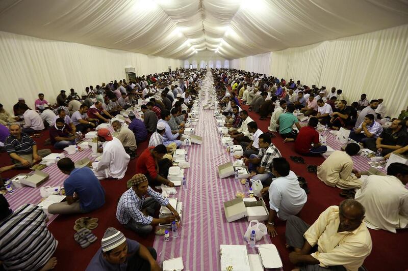 Thousands broke their fast in iftar tents at Sheikh Zayed Grand Mosque in Abu Dhabi on the first day of Ramadan. Pawan Singh / The National