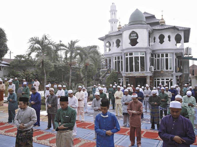 Muslim men perform Eid prayers in Kuala Lumpur, Malaysia. Getty Images