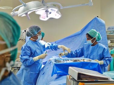 Female surgeons have reduced patient mortality rates compared to their male counterparts, a new study has found. Antonie Robertson / The National