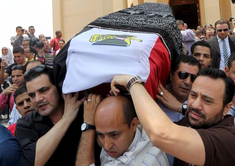 Mourners carry the coffin of Egyptian actor Omar Sharif during his funeral procession at the grand mosque of the Mushir Tantawi in Cairo, Egypt, July 12, 2015. Mohamed Abd El Ghany/Reuters