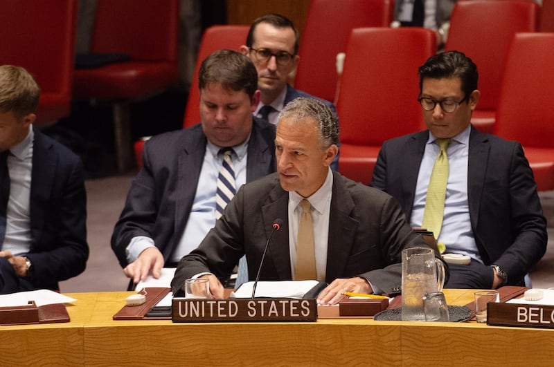 epa07786757 Acting US Ambassador to the United Nations Jonathan Cohen (C) speaks during the UN Security Council meeting in connection with the US missile development in violation of the Treaty on the Elimination of Medium and Small Range Missiles in New York, USA, 22 August 2019.  EPA/BRYAN R. SMITH