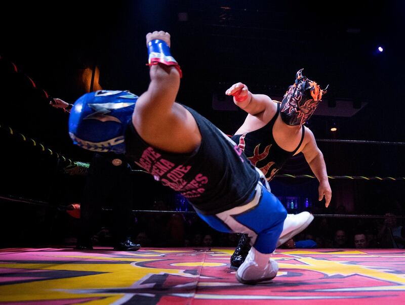 Nacho Libre wrestlers perform during the Lucha Vavoom "Valentines Day" show at the Mayan Theatre, California, USA. AFP