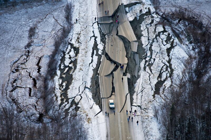 Damage is visible on roads in Wasilla, Alaska, after earthquakes hit the surrounding area. AP