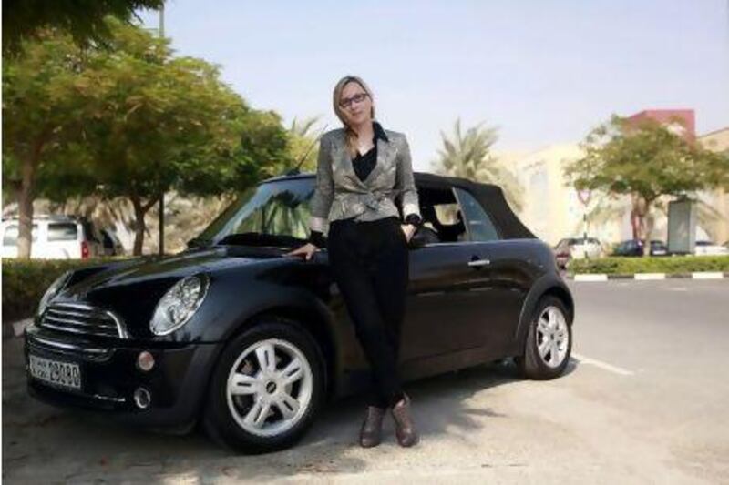 Yelena Swain appreciates the handling and speed of the Mini Cooper so much that she's bought the model twice in the past seven years, albeit in different colours. Satish Kumar / The National