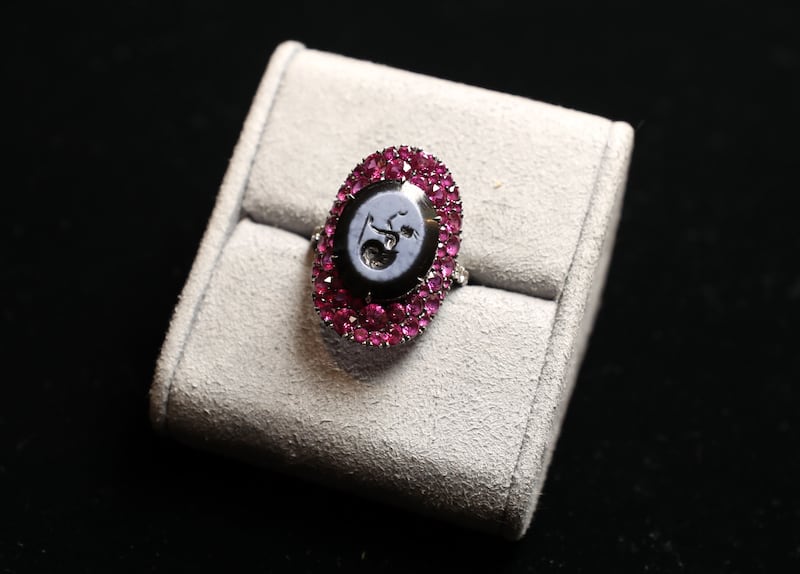 Onyx, ruby and diamond ring 