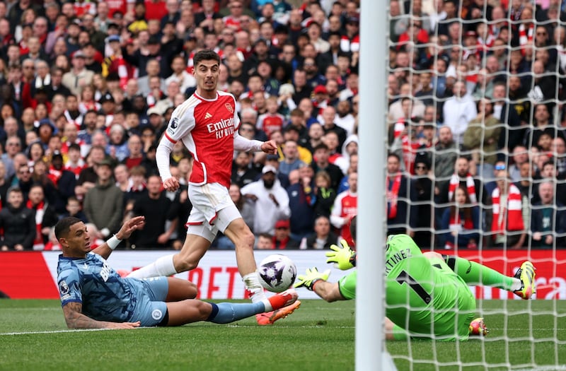Aston Villa's Emiliano Martinez saves from Arsenal's Kai Havertz. Reuters